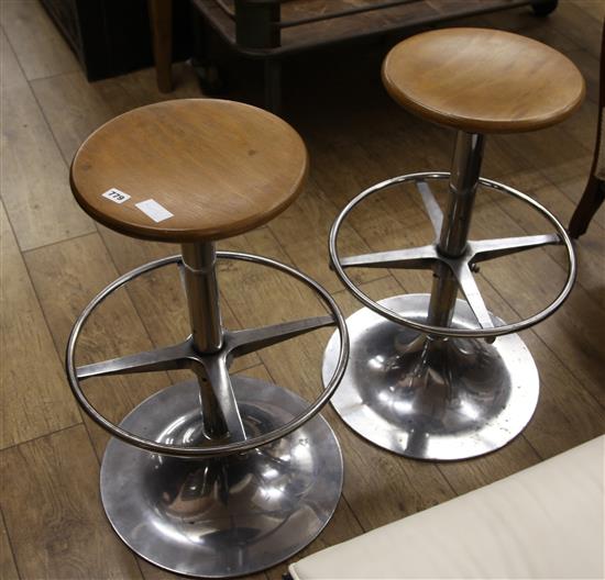 A pair of vintage kitchen stools